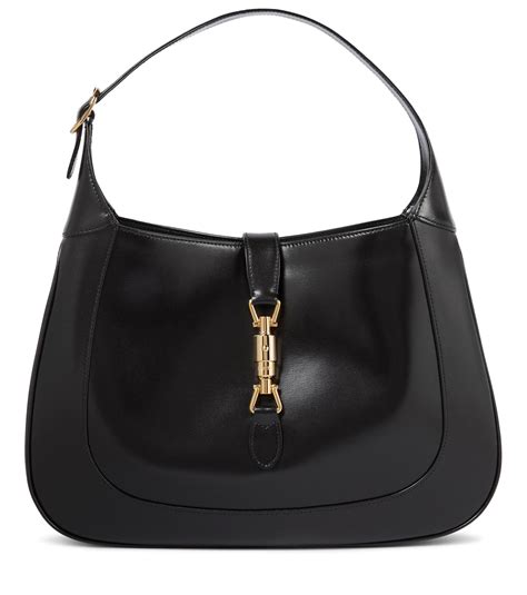 gucci black flat hobo with side silver logo bars|Jackie 1961 Medium Hobo Bag In Black Leather .